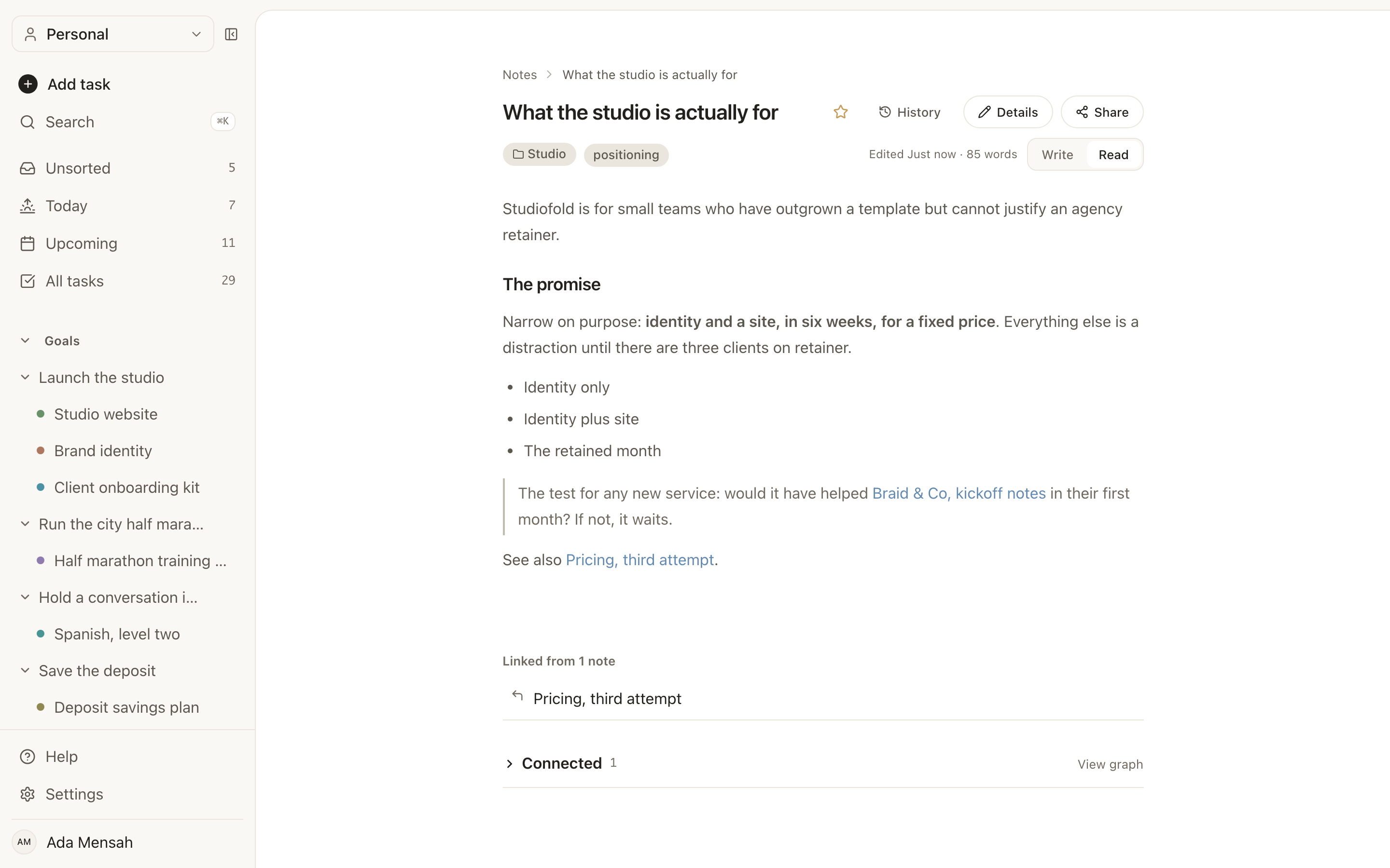 A note open in EvyOS: a markdown document with headings, a list and a quote, its folder and tag above, a word count and last-edited time, and buttons for history and details