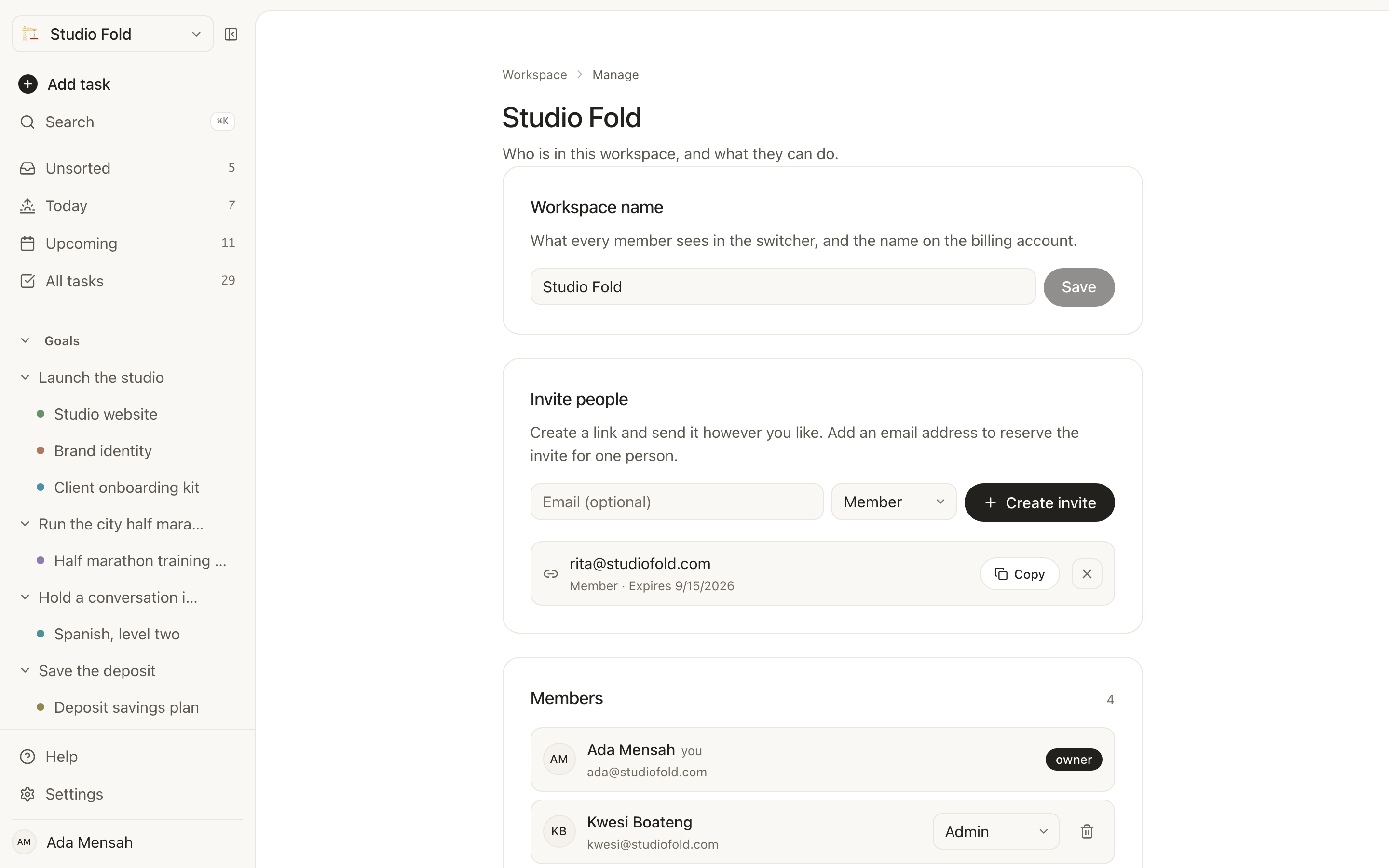 Managing a workspace in EvyOS: creating an invite link, a pending invite with its expiry, and every member with their role